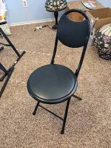 lot 29 image: Small Black Folding Chair.