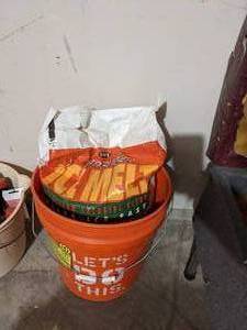 lot 54 image: Bag of Ice Melt with 5 Gallon Bucket.