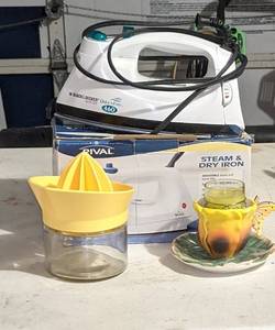 lot 94 image: Rival Steam and Dry Iron and two other items.