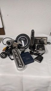 lot 112 image: Lot of Electronic items to include cameras, led lights, phone charger and more.