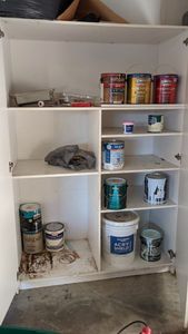 lot 128 image: Inside Contents of Cabinet not to include Cabinet. Mostly Paint.
