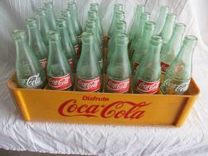 lot 48 image: 24-Coca-Cola Soda Bottles With Plastic Coca-Cola Case