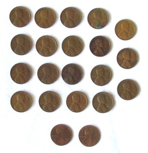 lot 21 image: Mid century wheat pennies and two 2009 Lincoln 200th birthday pennies