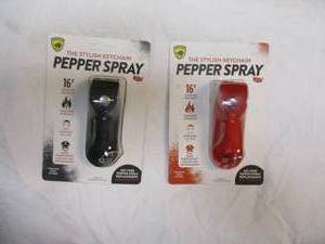 lot 58 image: HIS AND HERS GUARD DOG-PEPPER SPRAY, THE STYLISH KEYCHAIN