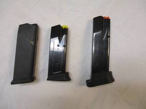 lot 68 image: 3-Pistol Magazines   TAURUS PT111 PRO CAL. 9-mm 10-Rd. magazine