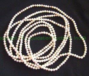 lot 55 image: Opera length continuous multi color pastel ombre pearl necklace. 96L Finely individually knotted.