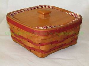 lot 57 image: Longaberger handwoven basket with wood lid
