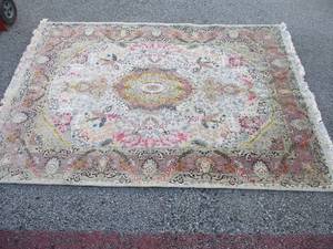 lot 27 image: 5-Ft x 7-Ft. Hand made Persian Tabriz  Rug, With A Center Medallion Design, Made In Iran.