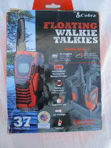 lot 4 image: Pair of Cobra Microtalk Model CTX 1095 Floating-Rechargeable Walkie Talkie, 2 way radios With Micro-USB Docking Station.
