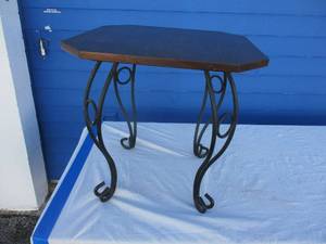 lot 85 image: Wrought Iron And Wood EndPatio Table