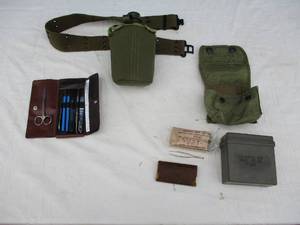 lot 115 image: Pistol Belt With Cantine, Set Medical Instruments, Military Medical Pouch With Insert Case and Extras