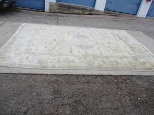 lot 31 image: Handmade Persian Tabriz Rug, With A Center Medallion Design, Made In Iran. The rug is about 9-Ft, 11-In.  x 13-Ft, 10-In.