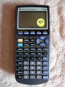 lot 37 image: TEXAS INSTRUMENTS TI-83 CALCULATOR