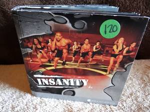 lot 120 image: INSANITY FITNESS PROGRAM - 10 DISK WORKOUT DVDS