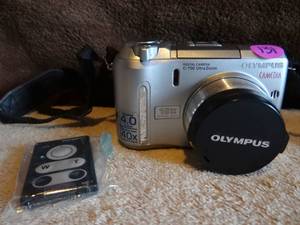 lot 131 image: Olympus C-750 4.0 Megapixel 40X Ultra Zoom Digital Photo Movie Camera and Cap