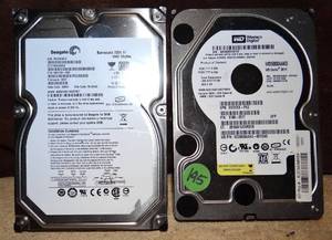 lot 195 image: PAIR OF WESTERN DIGITAL (500GB) AND SEAGATE (1TB) HARD DRIVES