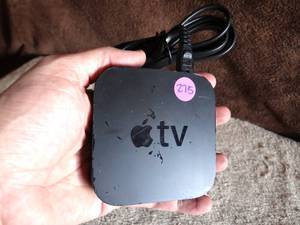 lot 275 image: APPLE TV STREAMING DEVICE WCHARGER