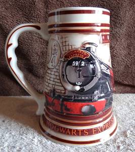 lot 284 image: Beer Mug Stein Wizarding World of Harry Potter Hogwarts Express Train 39 oz