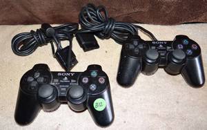 lot 312 image: VINTAGE PAIR SONY AYSTATION ANALOG CONTROLLERS