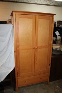 lot 163 image: Pine Armoire Cabinet, tag says Made in Brazil