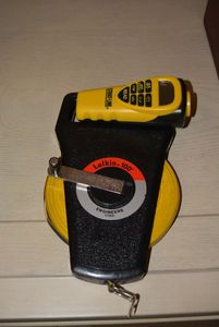 lot 100 image: Lufkin 100Ft. Engineers Tape Measure and Strait Line Laser Tape