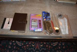 lot 99 image: Battery Charger Kit, Architectural Drafting Set, Leather Covered Journal Handmade in Italy