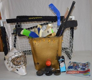 lot 191 image: Hockey Lot Goaltenders Helmet, Practice Goals, Sticks, Pucks and More