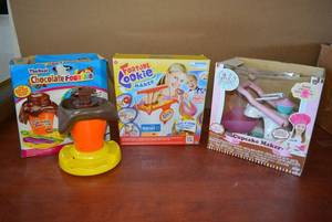 lot 194 image: The Real Chocolate Fountain, Fortune Cookie Maker looks unopened, Cupcake Maker Machine