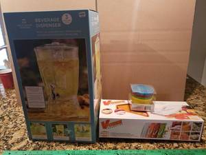 lot 220 image: 3 Gallon Beverage Dispenser from Bed, Bath & Beyond, Mandoline Slicer, Silicone MuffinCupcake Cups
