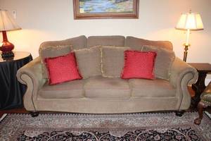 lot 8 image: Bernhardt Furniture 8 Foot Tan Couch with Button Trim Made with Duck Feathers