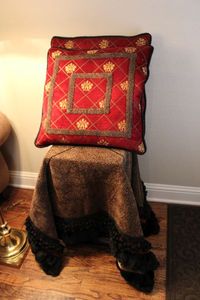 lot 43 image: Square Table Cover with Matching Pillows (Red, Gold and Black Colors)