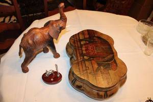 lot 33 image: Elephant Lot Scalloped Wooden Bowl with Painted Elephant Lid, Carved Wooden Elephant with Leather Ears, and Elephant Pen Holder