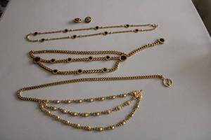 lot 62 image: St. John 3-Tier Gold Chain Belt, St. John Gold and Black BeltNecklaceEarrings Set