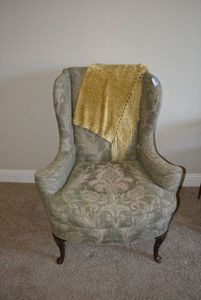 lot 113 image: Wingback Armchair with Sage Green and Cream Colored Floral Print