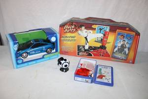 lot 209 image: Sports Marble Set, Mini Soccer Fan, Toyota Celica Model Car, and Black Belt Kit