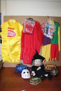 lot 219 image: Halloween Lot Costumes, Witch Puppet, Pumpkin Carving Set and More