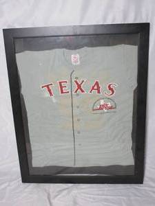 lot 92 image: FRAMED TEXAS RANGERS PROMOTIONAL DR. PEPPER SHIRT, SIGNED BY WILL CLARK