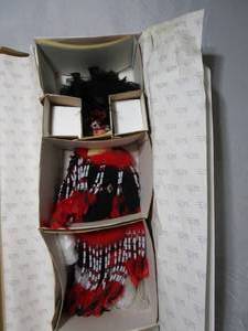 lot 95 image: RUSTYS COLLECTIBLE PORCELAIN DOLL, 42 TALL, RARE RED MOON NATIVE AMERICAN DOLL LIMITED EDITION, NEW OPEN BOX