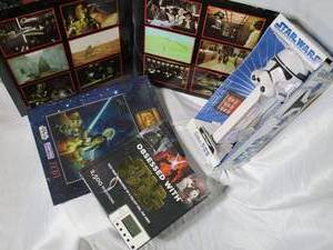 lot 220 image: STAR WARS LOT, GIANT CLONE TROOPER PEZ DISPENSER UNOPENED,TEST YOUR KNOWLEDGE STAR WARS BOOK, STAR WARS COLLECOR MOVIE SHOTS UNOPENED,1977 STAR WARS SOUNDTRACK ON RECORD