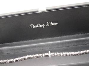 lot 66 image: NEW IN CASE 14 CT T.W. DIAMOND BRACELET SET IN 925 STERLING SILVER