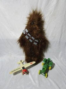 lot 268 image: VINTAGE LIMITED EDITION MOBILE GAS VEGA PLANE, DIE CAST JOHN DEERE TRACTOR, 1977 PLUSH CHEWBACA