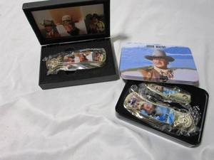 lot 129 image: JOHN WAYNE COLLECTOR KNIVES W PRESENTATION CASES