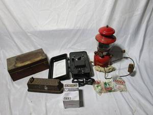 lot 75 image: DEFIANT REPLACEMENT MOTION SENSOR IN BOX,SENSIBLE N.R.S. &amp CO CAST IRON BLOCK, ANTIQUE SPRINKLER IN WOOD BOX, VINTAGE COLEMAN LANTERN W XTRA WICK,