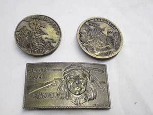 lot 313 image: 3 VINTAGE BELT BUCKLES, GERONIMO LYNTONE BELTS INC, 1974 ARKANSAS LEWIS BUCKLES CO, 1974 KANSAS LEWIS BUCKLES CO