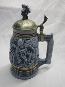 lot 334 image: 1991 CONQUEST OF SPACE STEIN COLLECTIBLE, HANDCRAFTED IN BRAZIL. AVON FINE COLLECTIBLES.