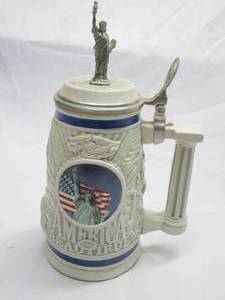 lot 346 image: 1998 AMERICA THE BEAUTIFUL STEIN COLLECTIBLE. HANDCRAFTED IN BRAZIL EXLUSIVLEY FOR AVON.
