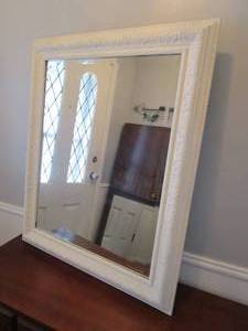lot 22 image: WALL MOUNTED MIRROR
