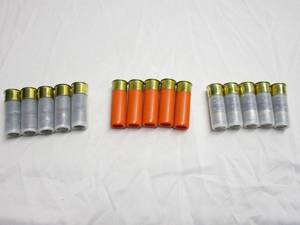 lot 43 image: EXOTIC 12 GAUGE AMMO 5 ROUNDS OF DOUBLE SLUG, 5 PITBULL ROUNDS, 5 ROUNDS OF DRAGONS BREATH. YouTube links in description
