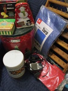 lot 159 image: SPRINT PALM PHONE, SUPER BOWL XXX TIN, XMAS TINS, UNOPENED 5X7 TARP, PLASTIC TABLE CLOTH COVERS