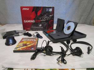 lot 139 image: Z170A GAMING M7 MOTHERBOARD, LOGITECH BLUETOOTH MOUSE, MICROSOFT BLUETOOTH MOUSE, HEADSETS, HEROES PC GAME, CD CASES W SOFTWARE